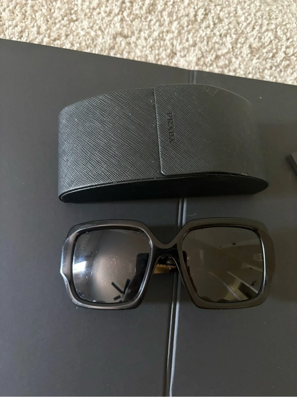 Prada Black Frame Sunglasses with Tortoiseshell Temples